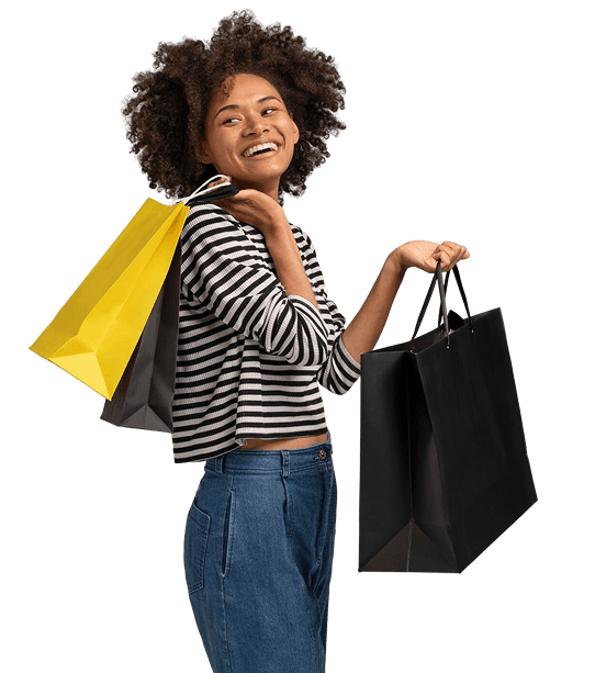 Smiling woman with shopping bags