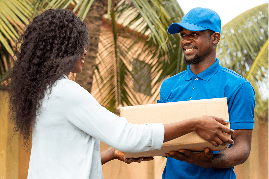 Delivery person handing package
