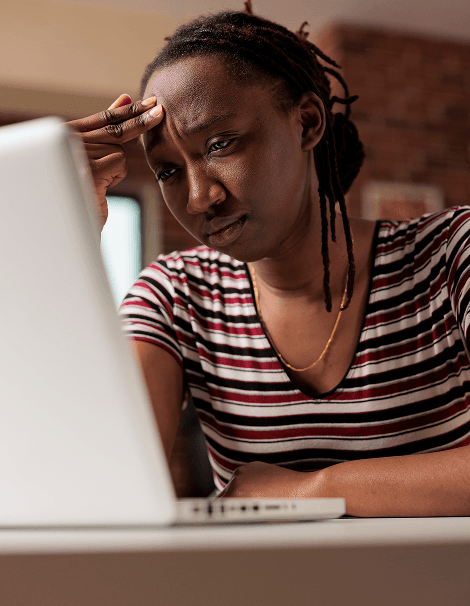 Frustrated woman with laptop experiencing network issues