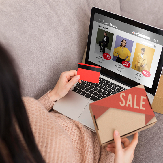 Online marketplace on laptop showing products
